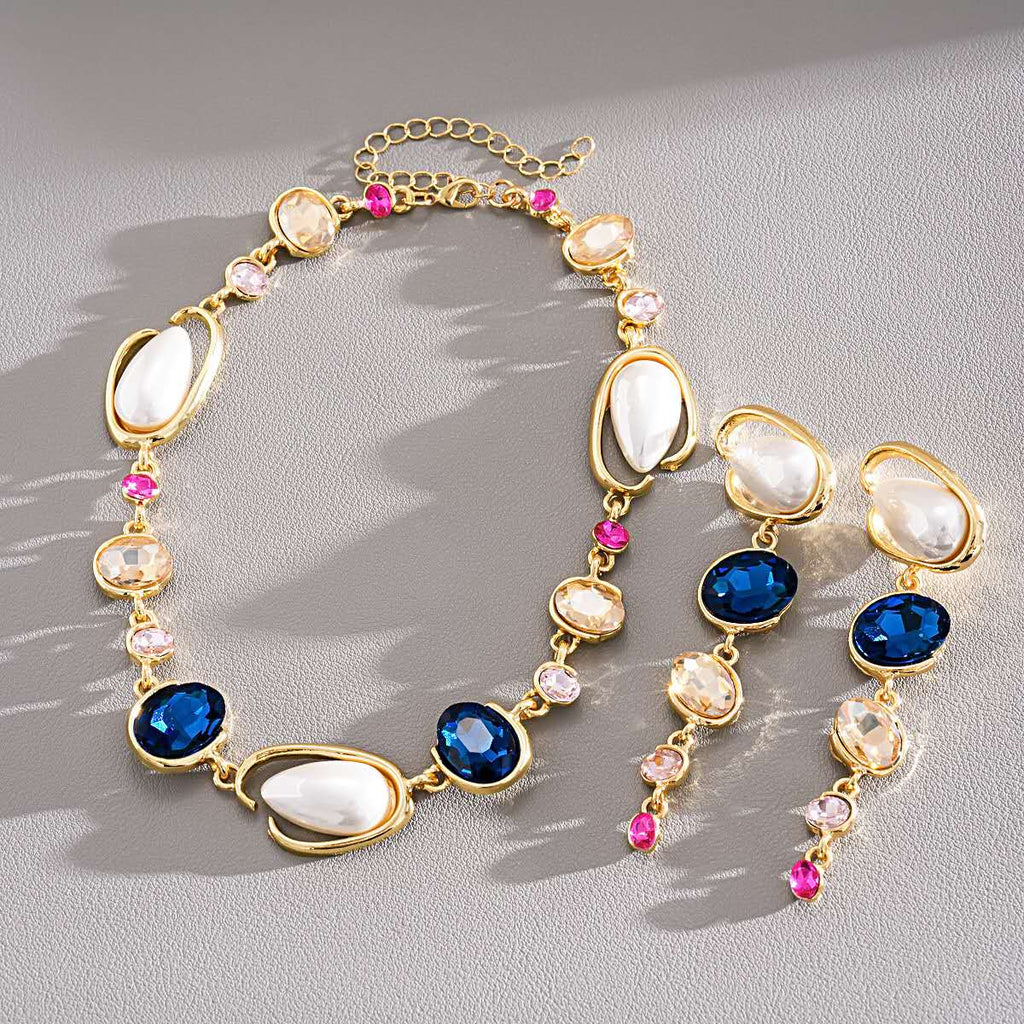 Set with irregular pearls, blue crystals and zirconia 2 PCS