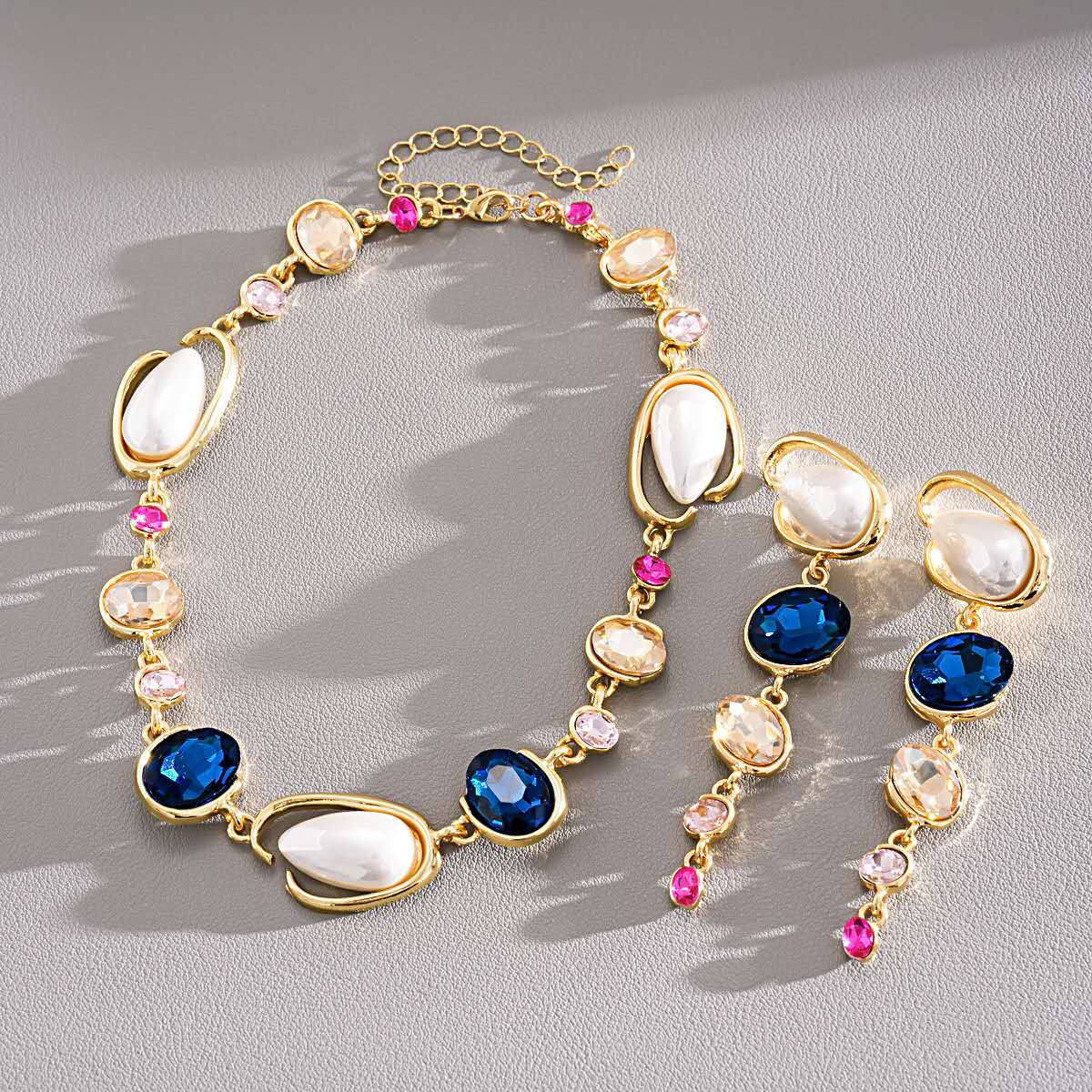 Set with irregular pearls, blue crystals and zirconia 2 PCS