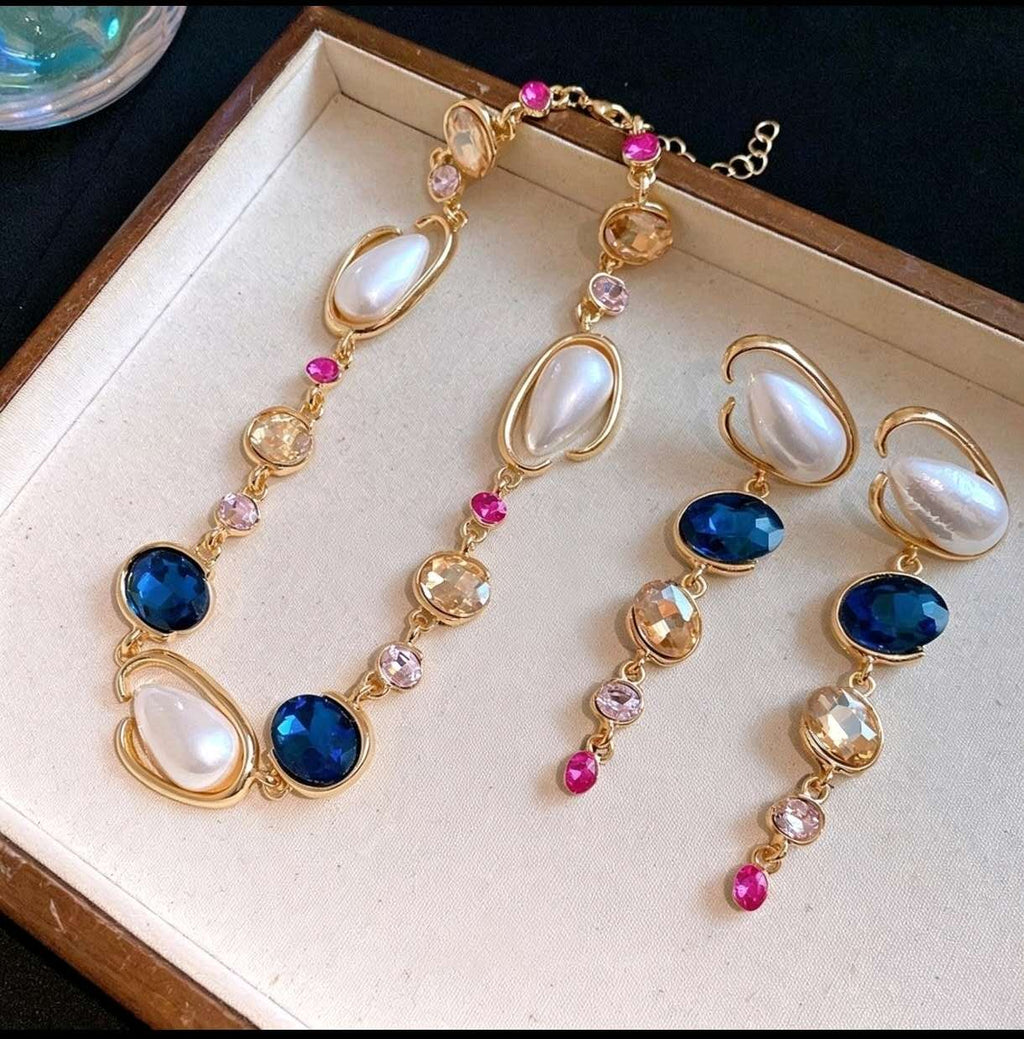 Set with irregular pearls, blue crystals and zirconia 2 PCS