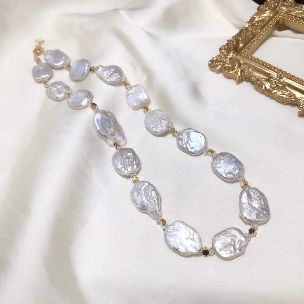 Necklace of natural baroque pearls