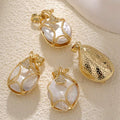 Necklace with pendants made out of natural baroque pearls or natural seashell