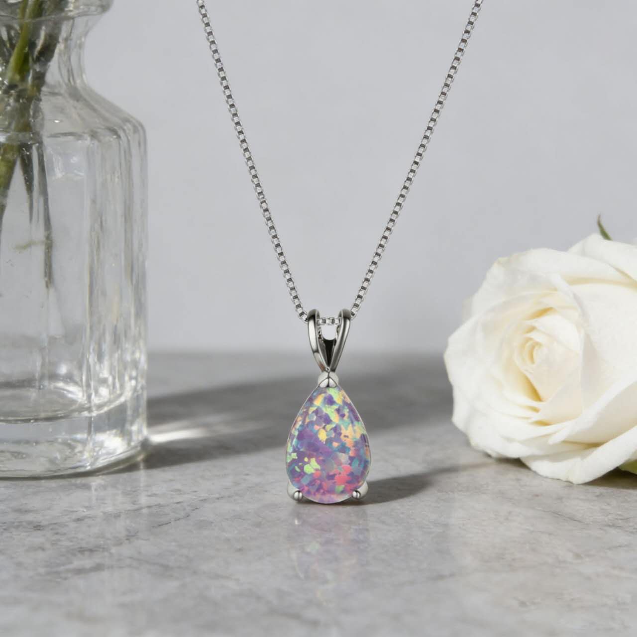 necklace with teardrop-shaped opal pendant