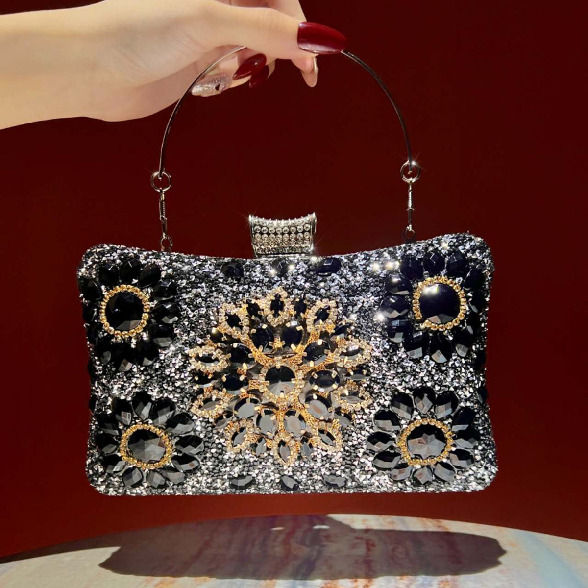 Elegant hard-shell clutch with cubic zirconia and rhinestones.