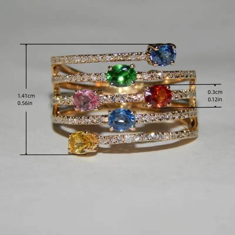 Multi-layered ring with rhinestones and colored cubic zirconia