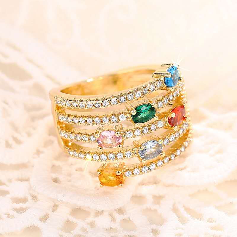 Multi-layered ring with rhinestones and colored cubic zirconia