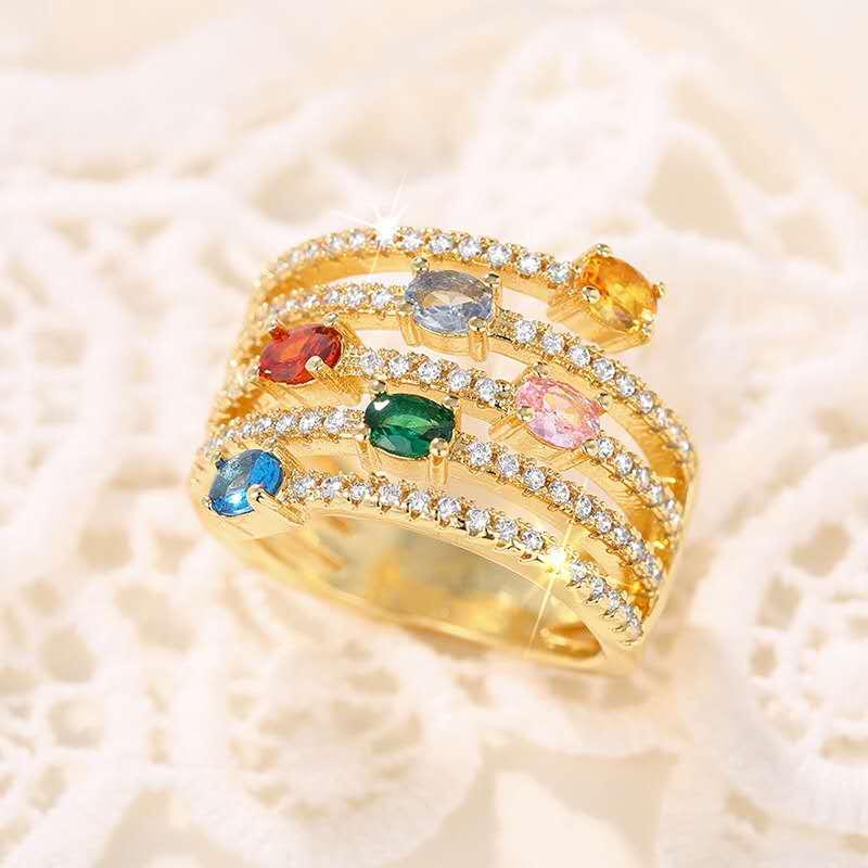 Multi-layered ring with rhinestones and colored cubic zirconia