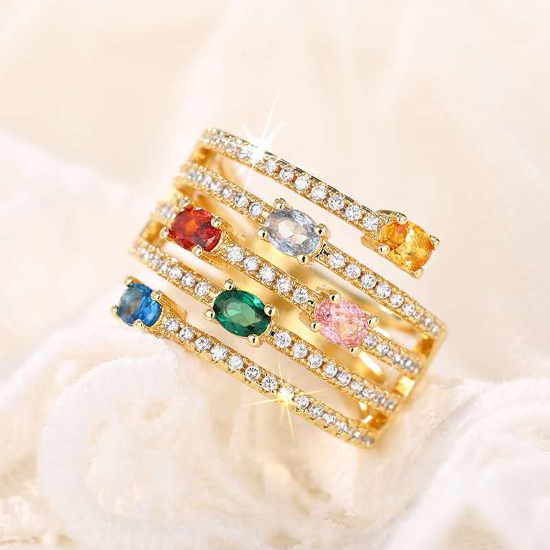 Multi-layered ring with rhinestones and colored cubic zirconia