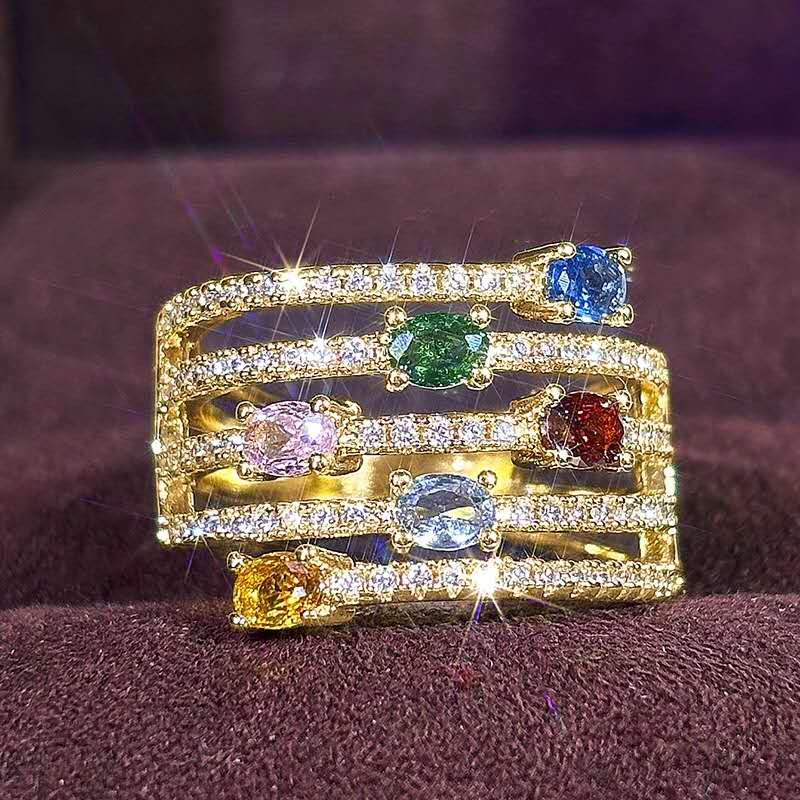 Multi-layered ring with rhinestones and colored cubic zirconia