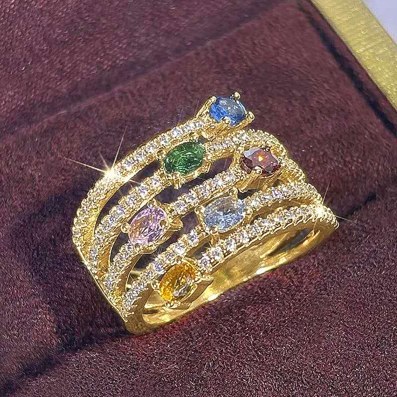 Multi-layered ring with rhinestones and colored cubic zirconia