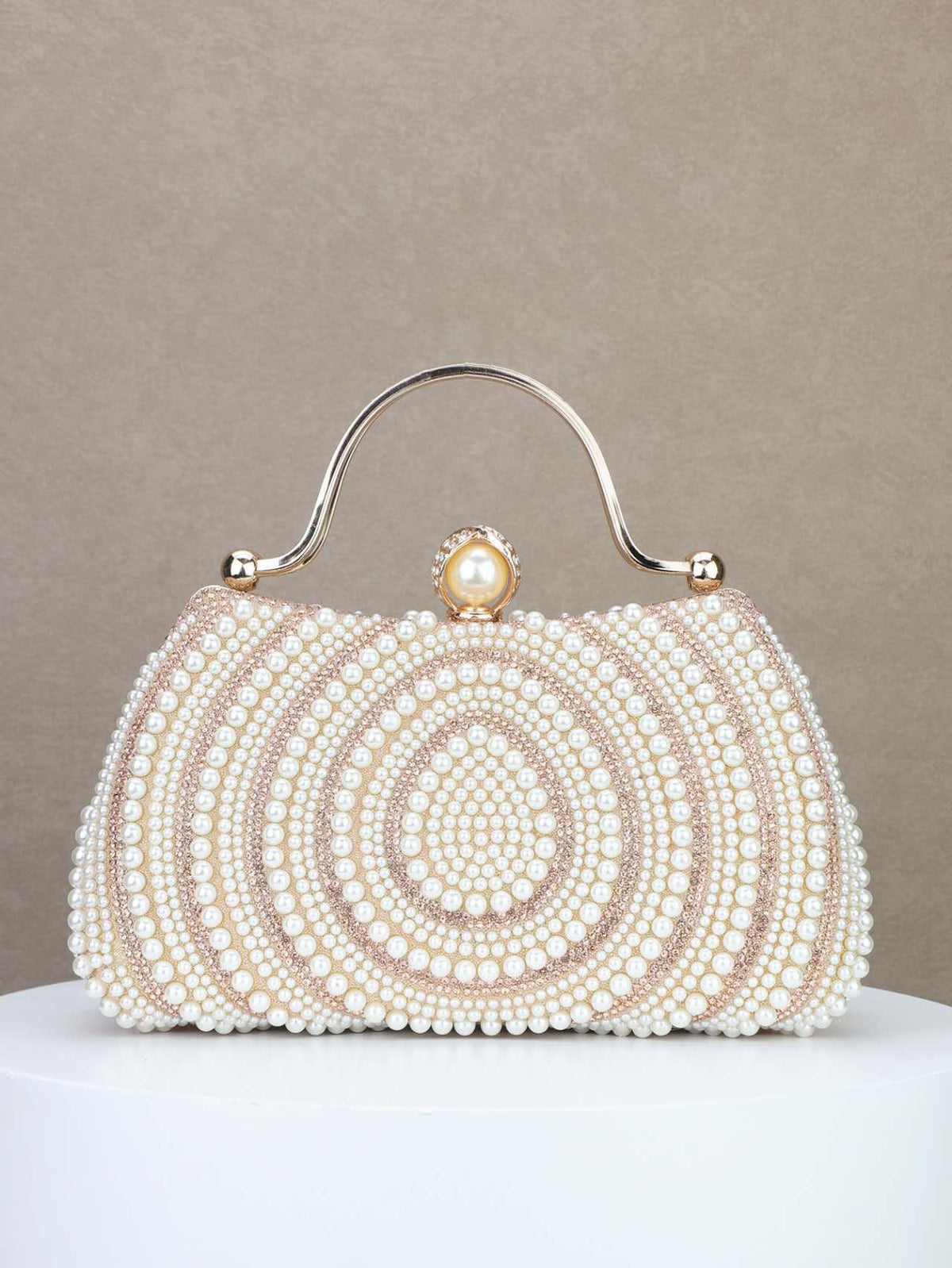 Elegant hard-shell clutch with pearls and cubic zirconia