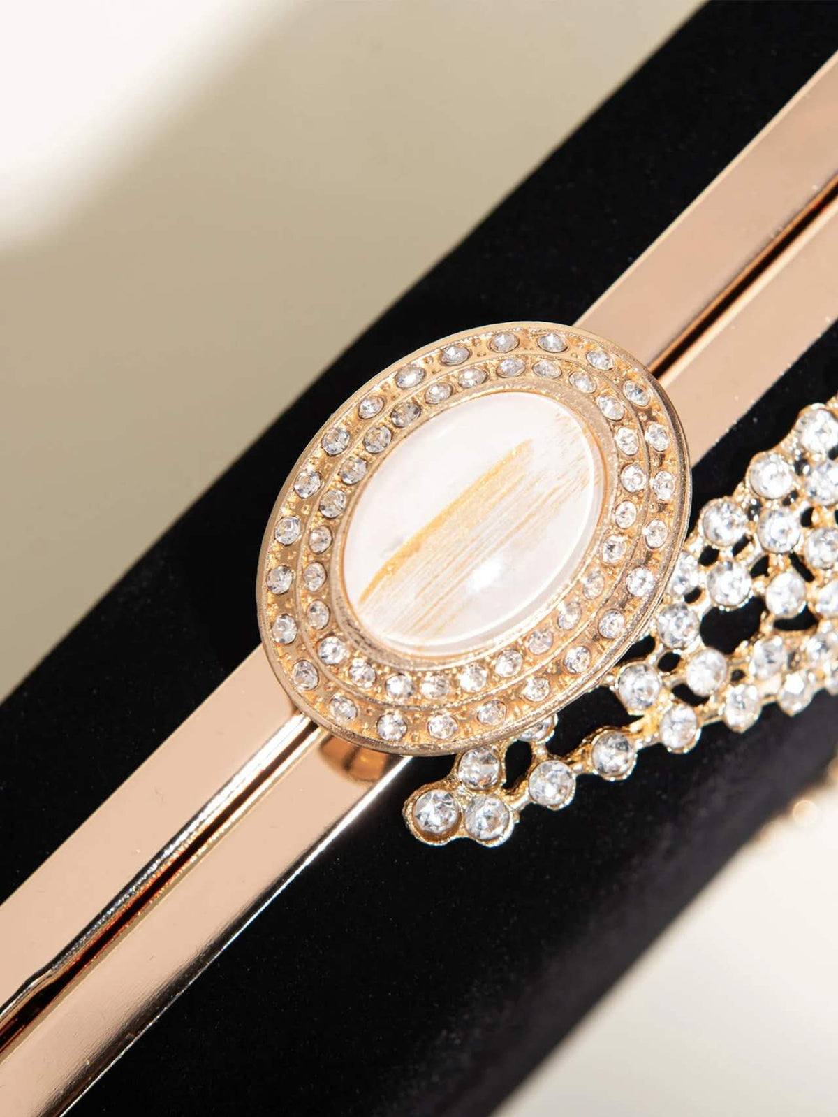 Trendy rigid velvet clutch with rhinestones