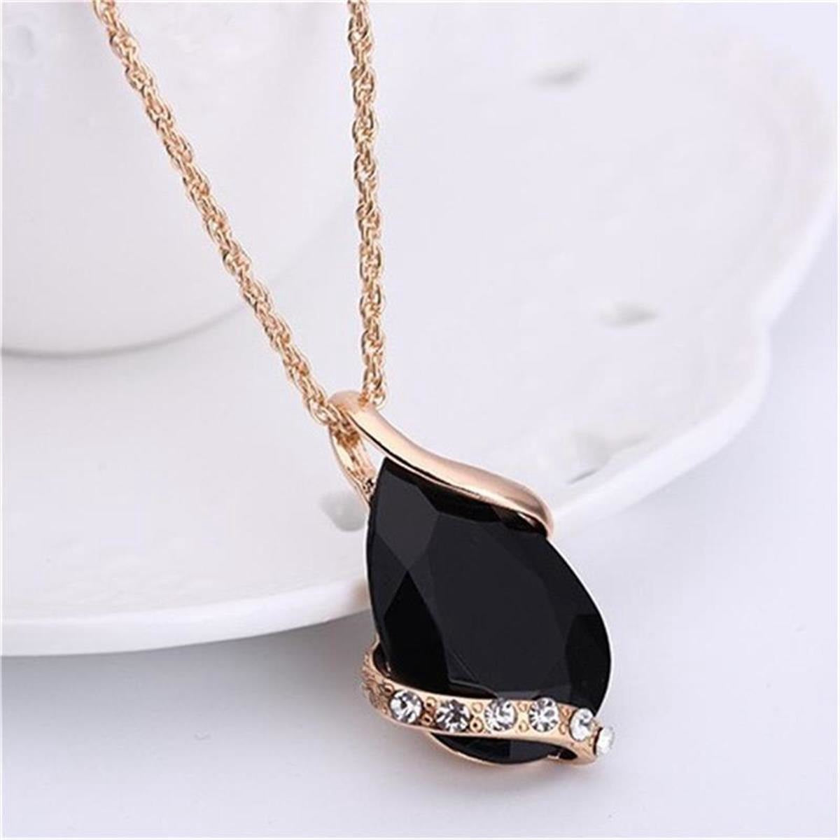 Parure de bijoux comprenant un collier avec pendentif en forme de goutte d'eau en cristal bleu et des boucles d'oreilles pendantes, en alliage de zinc hypoallergénique