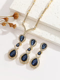 Parure de bijoux collier et boucles d'oreilles pendantes en cristal saphir bleu goutte d'eau