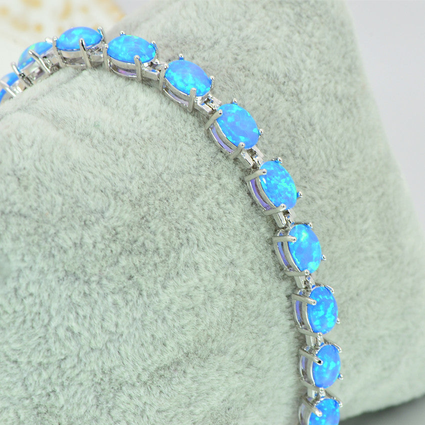 Pulsera de tenis de ópalo azul de plata de ley 925