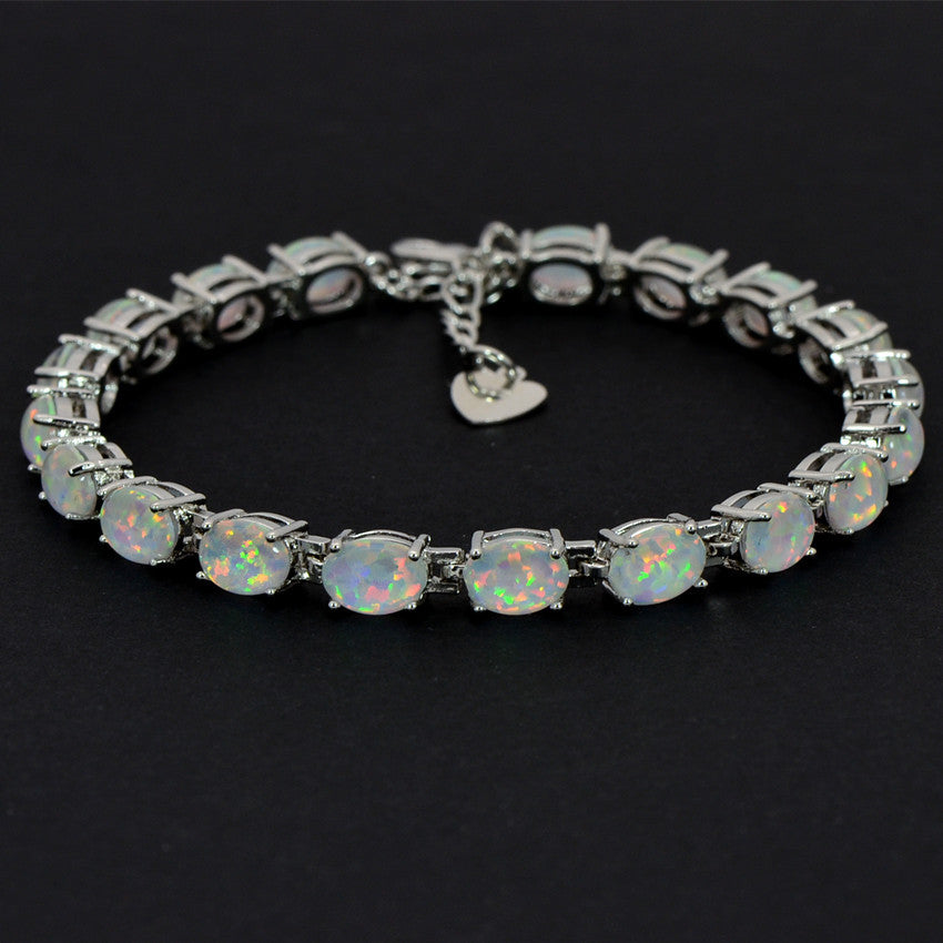 Pulsera de tenis de ópalo azul de plata de ley 925