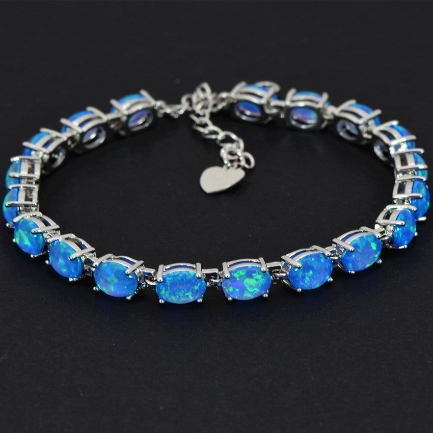 Pulsera de tenis de ópalo azul de plata de ley 925