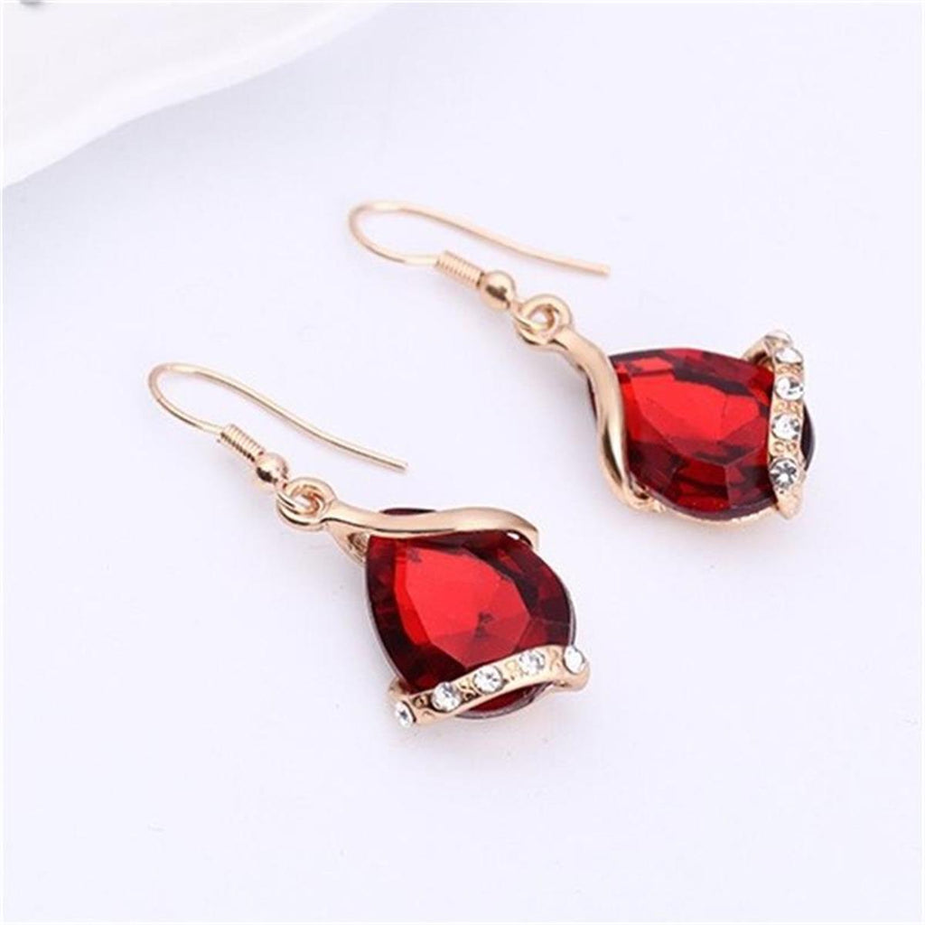 Parure de bijoux comprenant un collier avec pendentif en forme de goutte d'eau en cristal bleu et des boucles d'oreilles pendantes, en alliage de zinc hypoallergénique