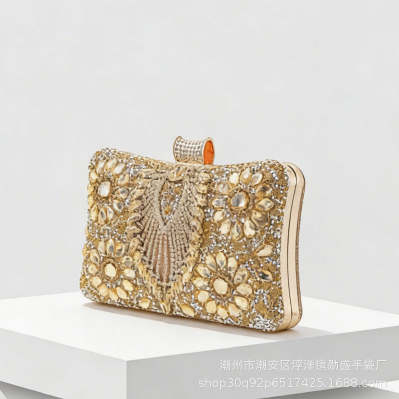 Rhinestone-embellished evening bag—a small, structured handbag/clutch suitable for formal events, featuring options for handheld, crossbody, or clutch carry.