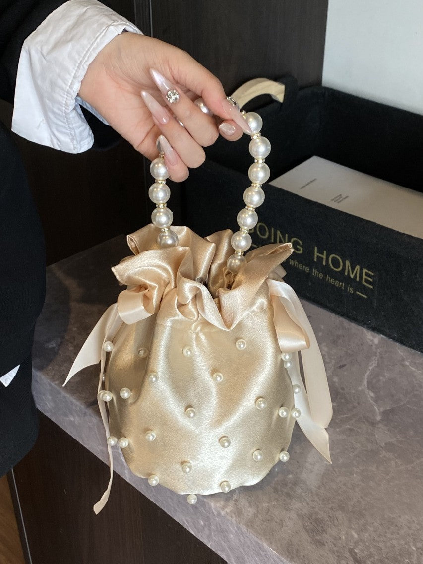 Niche-design beaded bucket bag—suitable for shoulder or crossbody wear; ideal as a bridal bag or a gift.
