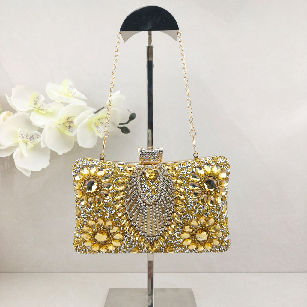 Rhinestone-embellished evening bag—a small, structured handbag/clutch suitable for formal events, featuring options for handheld, crossbody, or clutch carry.
