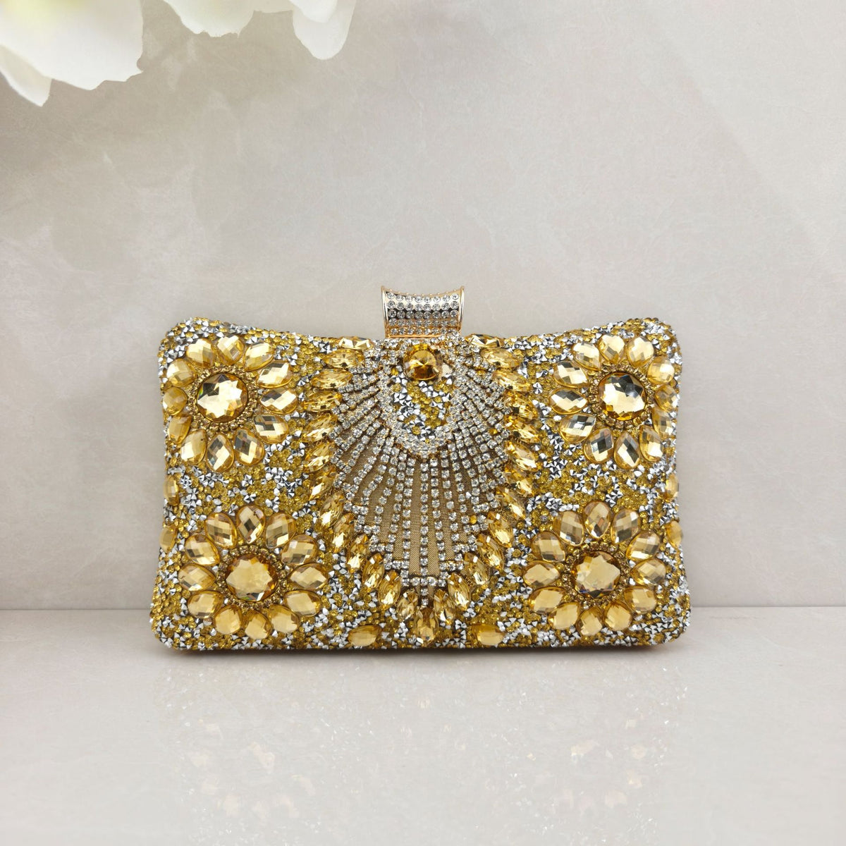 Rhinestone-embellished evening bag—a small, structured handbag/clutch suitable for formal events, featuring options for handheld, crossbody, or clutch carry.