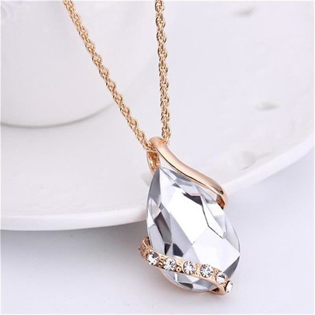 Parure de bijoux comprenant un collier avec pendentif en forme de goutte d'eau en cristal bleu et des boucles d'oreilles pendantes, en alliage de zinc hypoallergénique