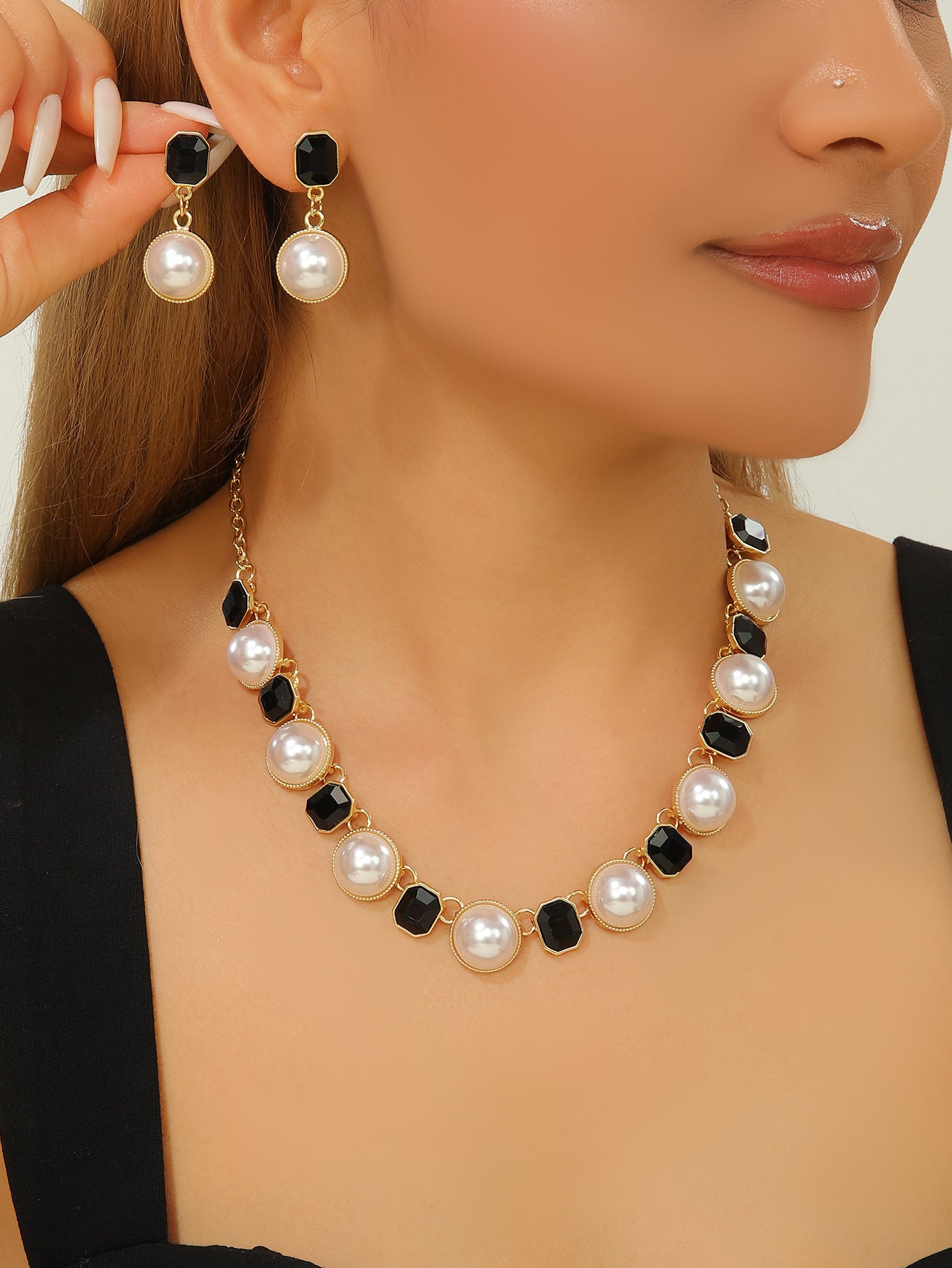 Conjunto de joyas de collar y pendientes de perlas de dos tonos y cristal octogonal vintage