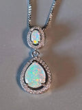 Necklace with two teardrop-shaped opals plated in 18K white gold