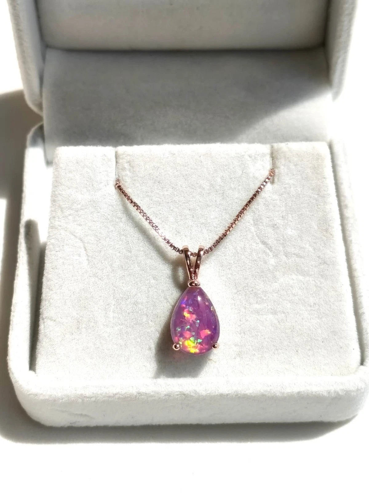 necklace with teardrop-shaped opal pendant