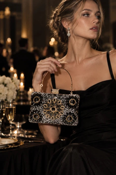 Elegant hard-shell clutch with cubic zirconia and rhinestones.